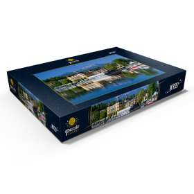 Darstellung des Puzzle Motivs Schlosshotel am See gegen Mittagskogel (2143m), Velden, Wörther See, Österreich - Puzzleteile: 1000