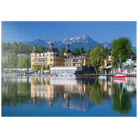 Darstellung des Puzzle Motivs Schlosshotel am See gegen Mittagskogel (2143m), Velden, Wörther See, Österreich - Puzzleteile: 1000