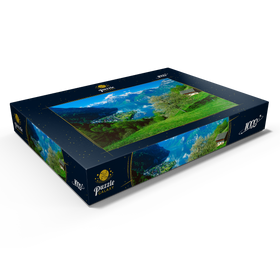 Darstellung des Puzzle Motivs Blick auf das Dorf am See gegen Gitschen und Urirotstock - Puzzleteile: 1000