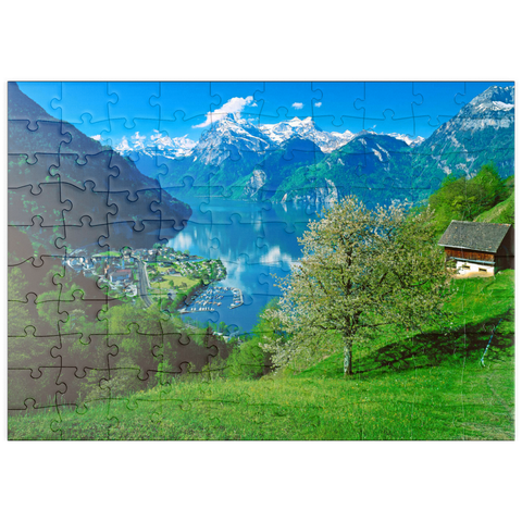 puzzleplate Blick auf das Dorf am See gegen Gitschen und Urirotstock 100 Puzzle