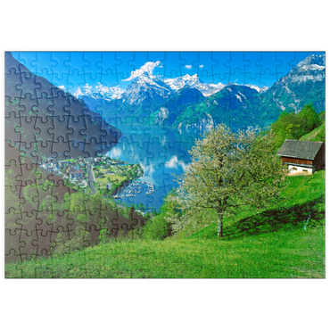 puzzleplate Blick auf das Dorf am See gegen Gitschen und Urirotstock 200 Puzzle