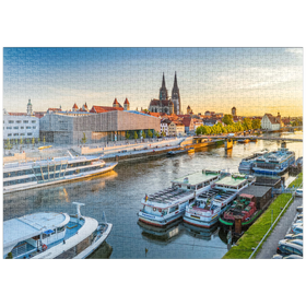 Darstellung des Puzzle-Motivs Museum der Bayerischen Geschichte am Ufer der Donau mit dem Regensburger Dom – Puzzleteile: 1000