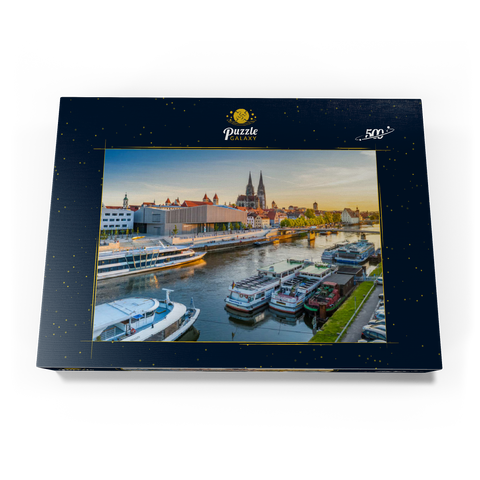 Museum der Bayerischen Geschichte am Ufer der Donau mit dem Regensburger Dom am Abend 500 Puzzle Schachtel Ansicht3