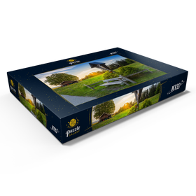 Darstellung des Puzzle Motivs Kreuz mit Bank bei Sonnenuntergang auf der Aidlinger Höhe - Puzzleteile: 1000