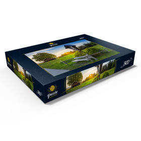 Darstellung des Puzzle Motivs Kreuz mit Bank bei Sonnenuntergang auf der Aidlinger Höhe - Puzzleteile: 500