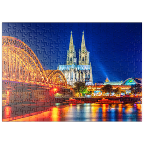 Darstellung des Puzzle Motivs Nachtsicht auf den Kölner Dom und Hohenzollernbrücke über Rhein, Deutschland - Puzzleteile: 200