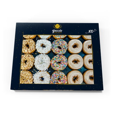 Frische Donuts mit verschiedenen Belägen aus der örtlichen Bäckerei. 100 Puzzle Schachtel Ansicht3